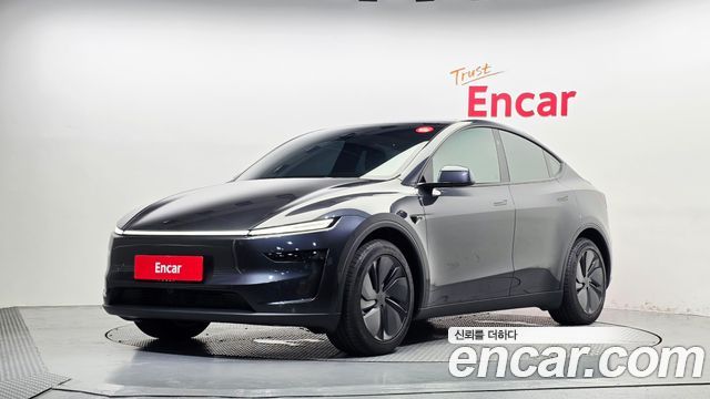 Tesla Model Y 2025 — photo 1