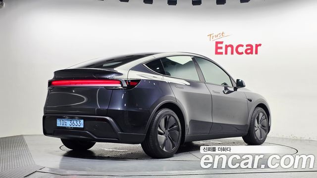 Tesla Model Y 2025 — photo 2