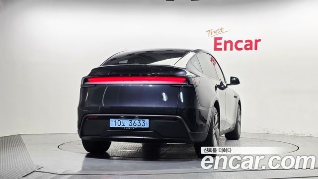 Tesla Model Y 2025 — photo 4