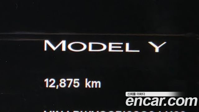 Tesla Model Y 2025 — photo 11