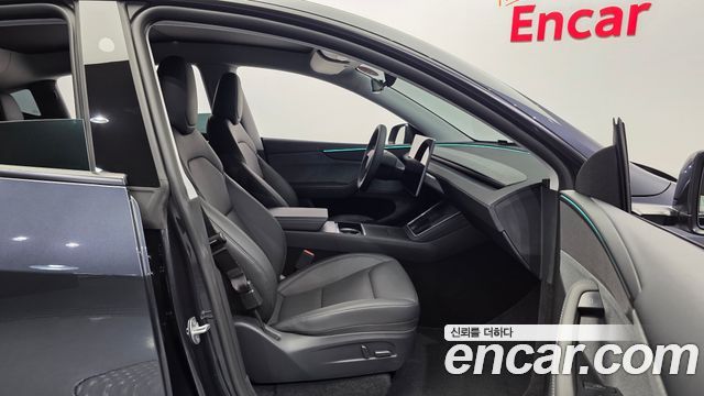 Tesla Model Y 2025 — photo 17