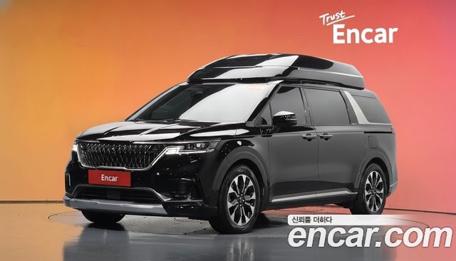 Kia Canival 2023 — photo 1