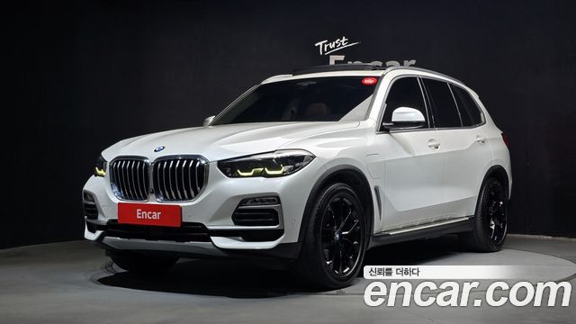 BMW X5 2021 — photo 1