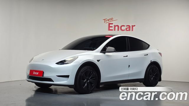 Tesla Model Y 2024 — photo 37