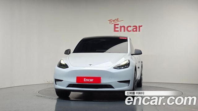 Tesla Model Y 2024 — photo 3