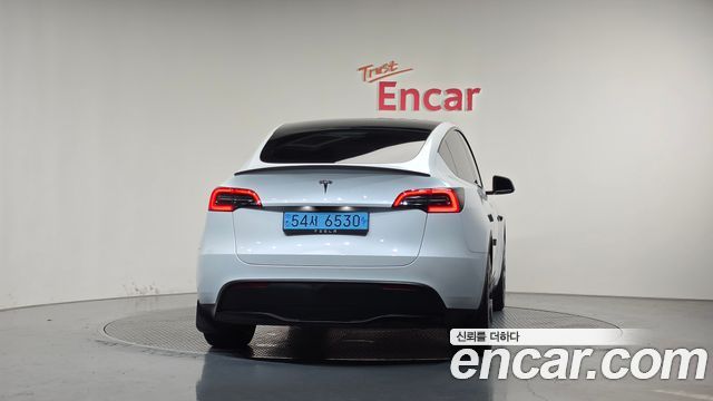 Tesla Model Y 2024 — photo 4