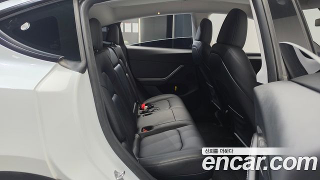 Tesla Model Y 2024 — photo 17