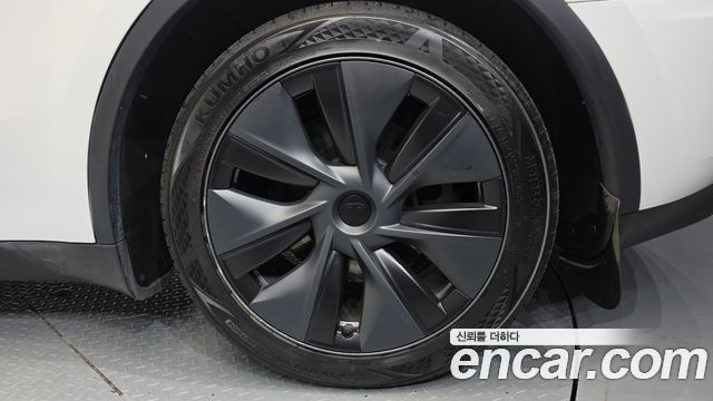 Tesla Model Y 2024 — photo 7