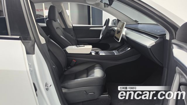 Tesla Model Y 2024 — photo 16