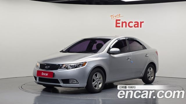 Kia Porte 2012 — photo 1