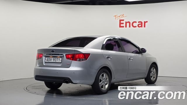 Kia Porte 2012 — photo 2