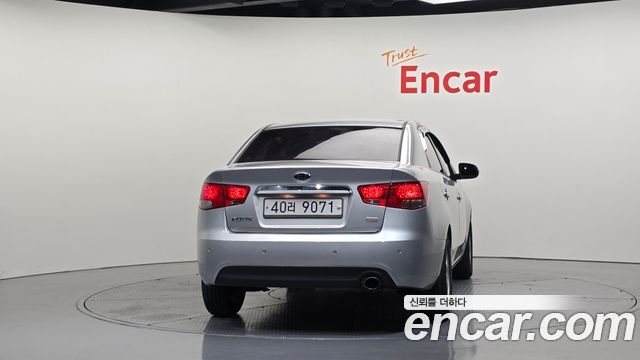 Kia Porte 2012 — photo 4