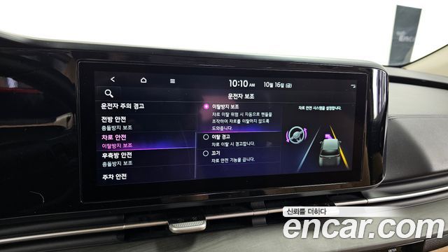 Kia Canival 2023 — photo 32