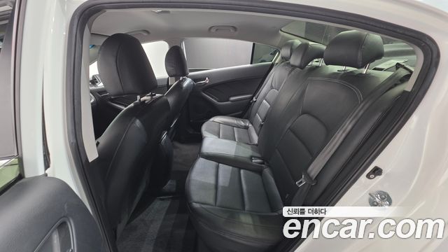 Kia K3 2013 — photo 18
