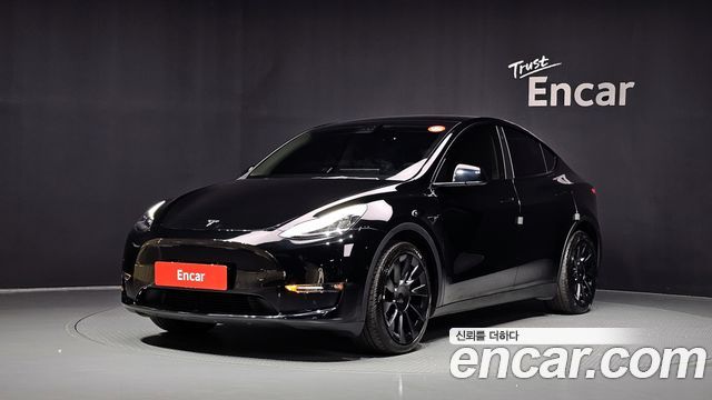Tesla Model Y 2022 — photo 1