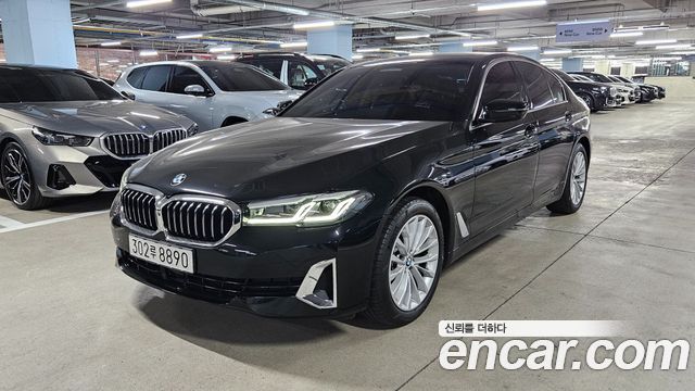 BMW 5-Series 2023 — photo 1