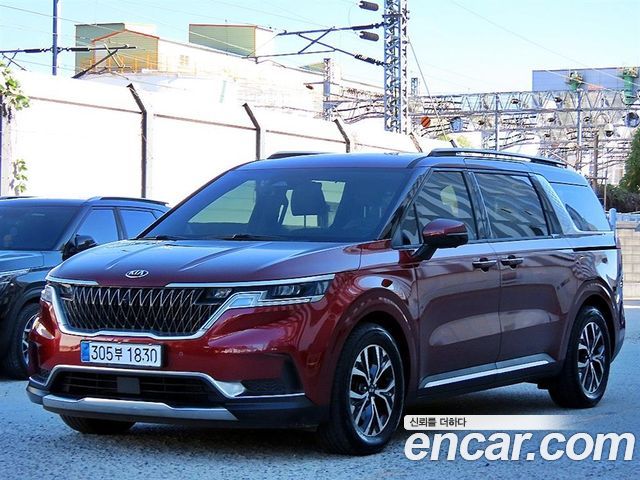 Kia Canival 2021 — photo 2