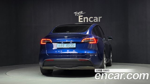 Tesla Model Y 2024 — photo 4