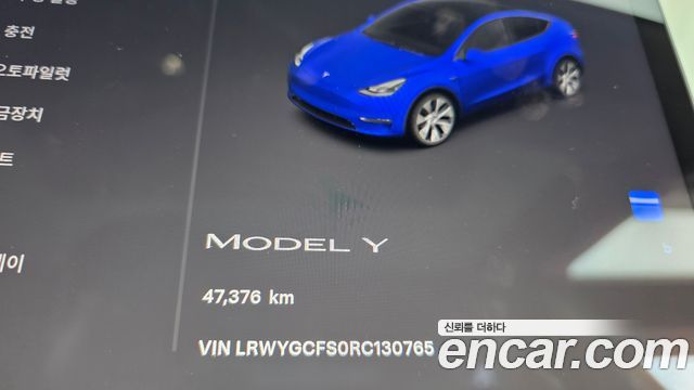 Tesla Model Y 2024 — photo 11