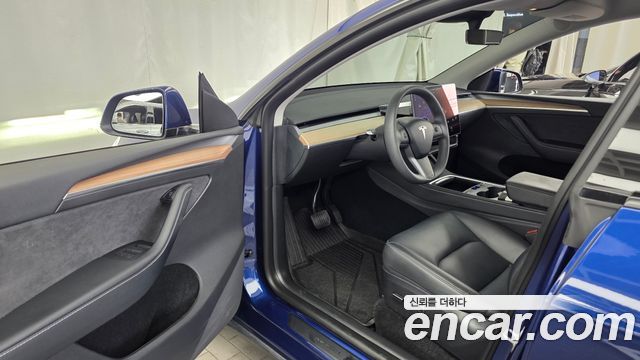 Tesla Model Y 2024 — photo 13