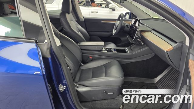 Tesla Model Y 2024 — photo 17