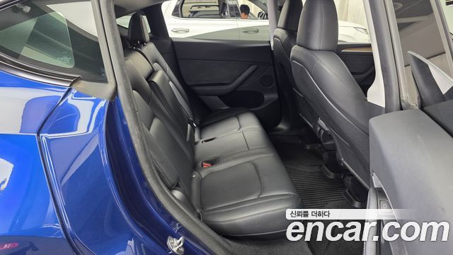 Tesla Model Y 2024 — photo 18