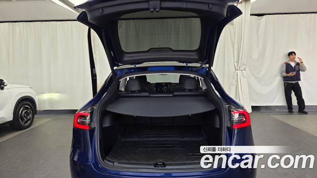 Tesla Model Y 2024 — photo 26