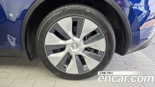 Tesla Model Y 2024 — photo 7