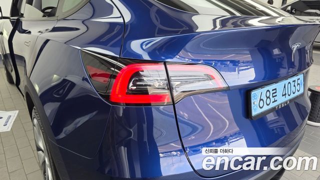 Tesla Model Y 2024 — photo 9