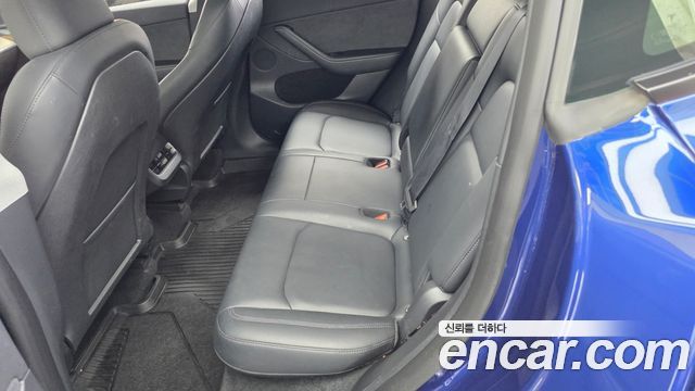 Tesla Model Y 2024 — photo 16