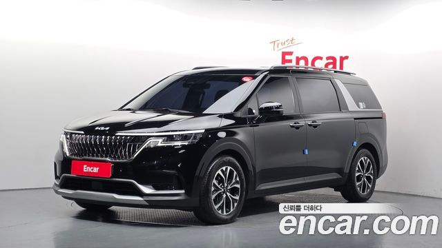 Kia Canival 2023 — photo 1