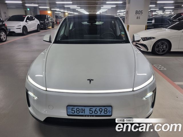 Tesla Model Y 2025 — photo 1