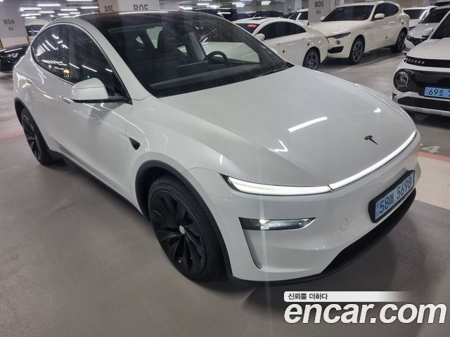 Tesla Model Y 2025 — photo 2
