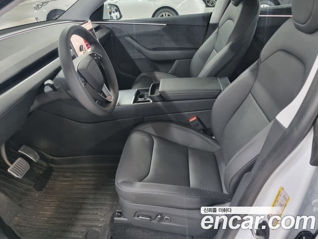 Tesla Model Y 2025 — photo 8