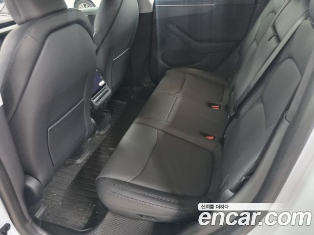 Tesla Model Y 2025 — photo 12