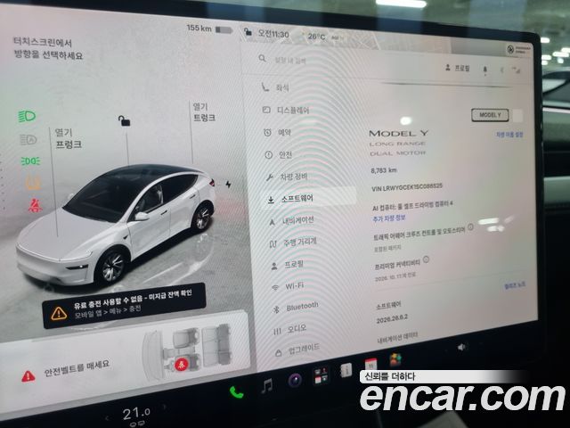 Tesla Model Y 2025 — photo 17