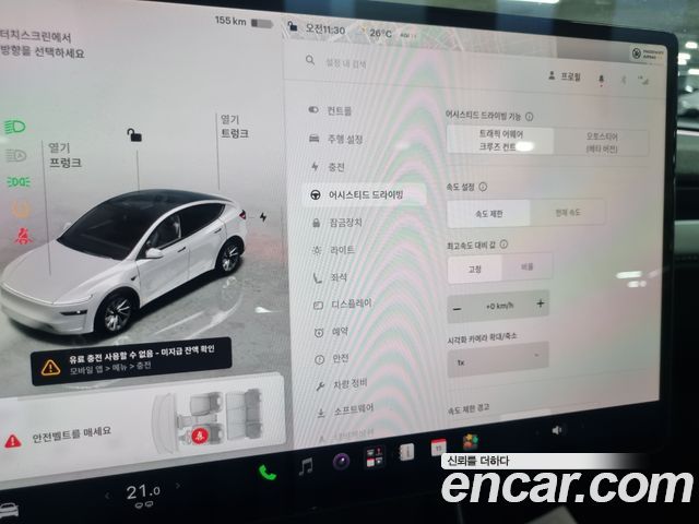 Tesla Model Y 2025 — photo 18