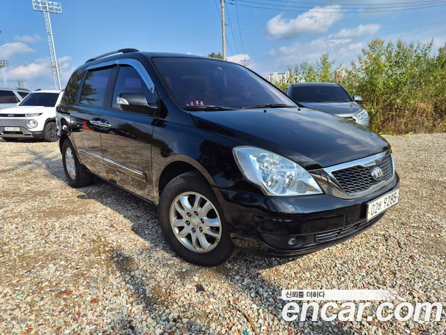 Kia Canival 2013 — photo 1