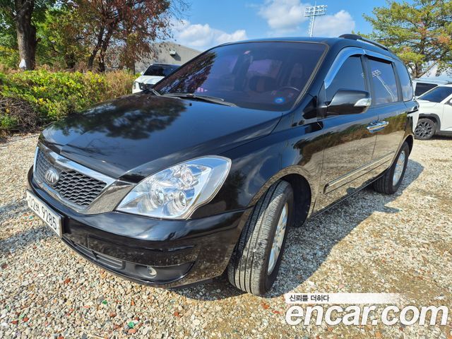 Kia Canival 2013 — photo 2