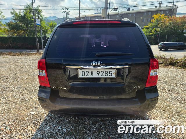 Kia Canival 2013 — photo 4