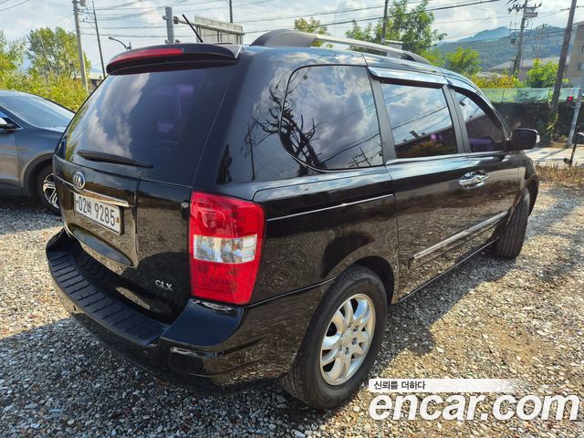 Kia Canival 2013 — photo 7
