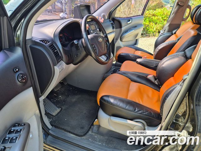 Kia Canival 2013 — photo 9