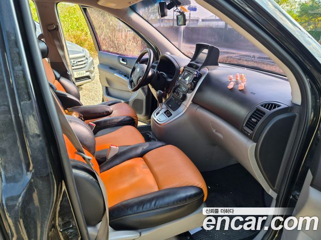 Kia Canival 2013 — photo 10