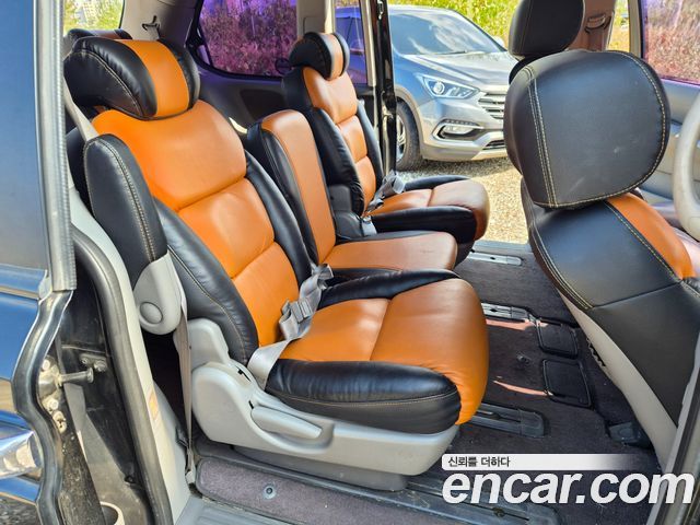 Kia Canival 2013 — photo 11