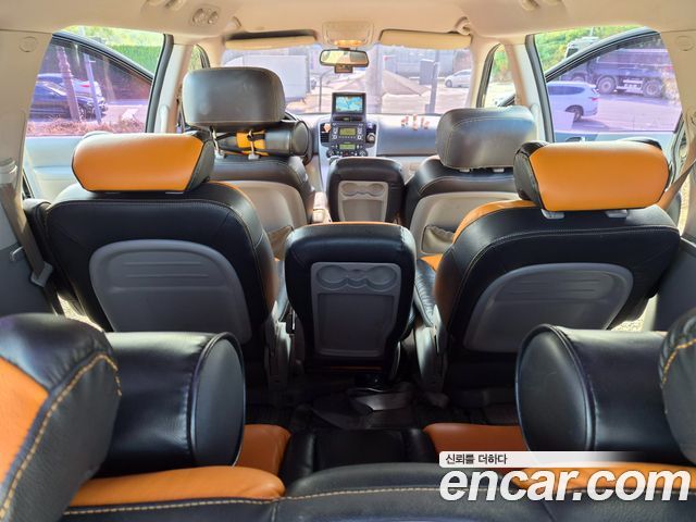 Kia Canival 2013 — photo 12