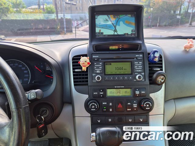 Kia Canival 2013 — photo 14