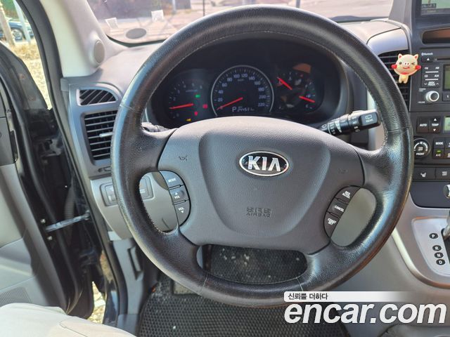 Kia Canival 2013 — photo 18