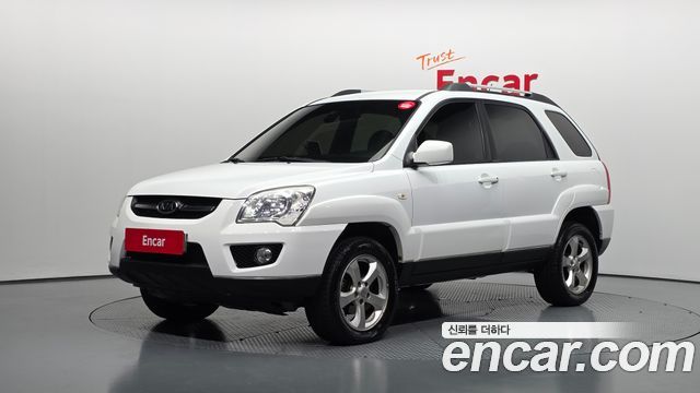 Kia Sportage 2010 — photo 1