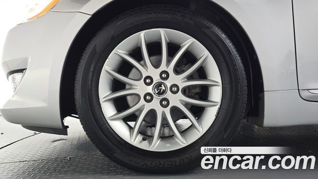 Kia K7 2011 — photo 5
