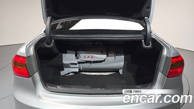 Kia K7 2011 — photo 25